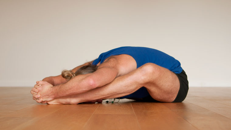 Butterfly pose with forward fold